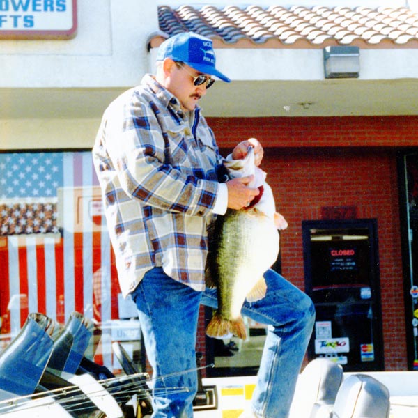 Robert Crupi and his lunker 22 lb lunker largemouth pictured here getting ready for an official weigh- in.