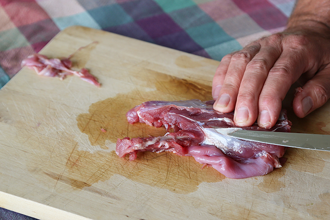 Cleaning Trimmed Chimichurri Rabbit