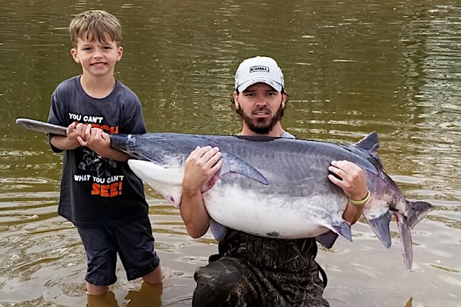Boy, 8, Tackles Two Prehistoric-Looking Fish on Same Day