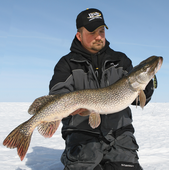 Tip Up Ice Fishing Pike - Petrowske's a northern Minnesota guide
