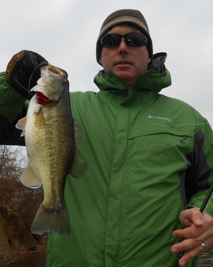 Mike Myers of Lawrence, Kansas, with the first largemouth bass of the outing.