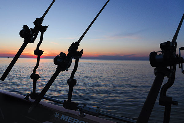 Canvas print boat trolling fishing gear downrigger and two rods