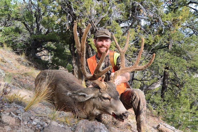 Joseph von Benedikt with mule deer in velvet